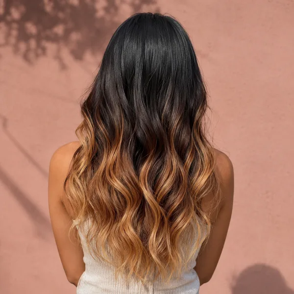 AI hair color changer rendering a black-to-caramel ombré hair color