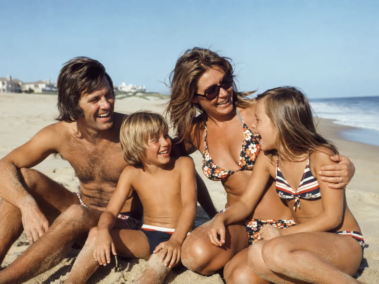 After — the 1970s family beach photo with color and contrast fully restored