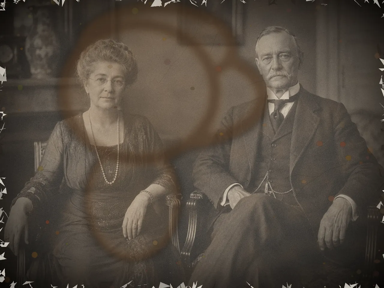 Before — a severely water-damaged antique 1920s portrait with mold spots and cracked emulsion