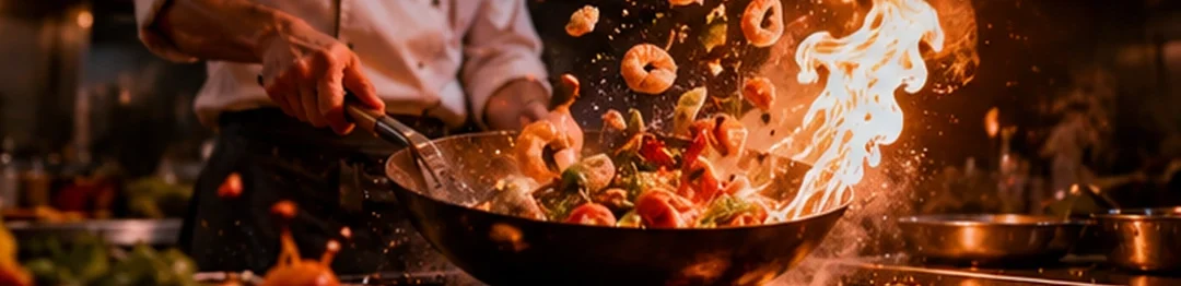 Kling 3.0 Turbo sample — a chef tossing food in a wok with a burst of flame