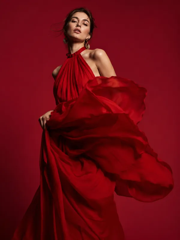 Qwen Image Edit result — a high-fashion model in a flowing red dress