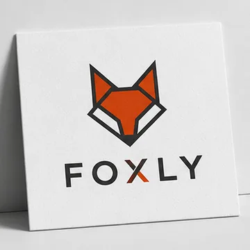 Seedream 4.0 logo design mockup of a geometric FOXLY fox-head wordmark