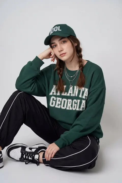 Relaxed urban streetwear portrait shot in an evening alley